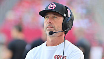 Jan 5, 2025; Glendale, Arizona, USA; San Francisco 49ers head coach Kyle Shanahan looks on in the first half against the Arizona Cardinals at State Farm Stadium. Mandatory Credit: Matt Kartozian-Imagn Images