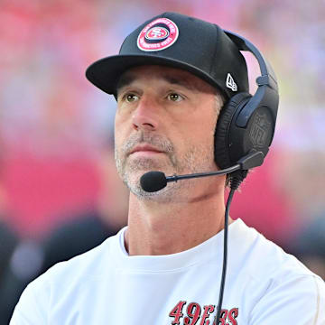 Jan 5, 2025; Glendale, Arizona, USA; San Francisco 49ers head coach Kyle Shanahan looks on in the first half against the Arizona Cardinals at State Farm Stadium. Mandatory Credit: Matt Kartozian-Imagn Images