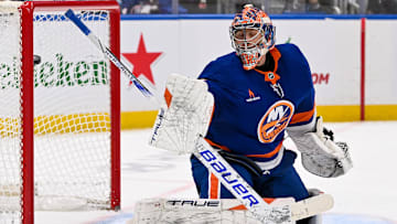 Nov 25, 2024; Elmont, New York, USA;  Detroit Red Wings left wing Lucas Raymond (23) (not pictured) scores a goal past New York Islanders goaltender Semyon Varlamov (40) during the third period at UBS Arena. Mandatory Credit: Dennis Schneidler-Imagn Images