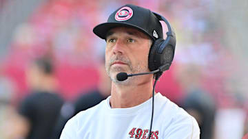 Jan 5, 2025; Glendale, Arizona, USA; San Francisco 49ers head coach Kyle Shanahan looks on in the first half against the Arizona Cardinals at State Farm Stadium. Mandatory Credit: Matt Kartozian-Imagn Images
