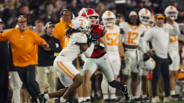 Nov 16, 2024; Athens, Georgia, USA; Georgia Bulldogs wide receiver London Humphreys (16) catches a pass in front of Tennessee Volunteers defensive back Jermod McCoy (3) in the fourth quarter at Sanford Stadium. Mandatory Credit: Brett Davis-Imagn Images
