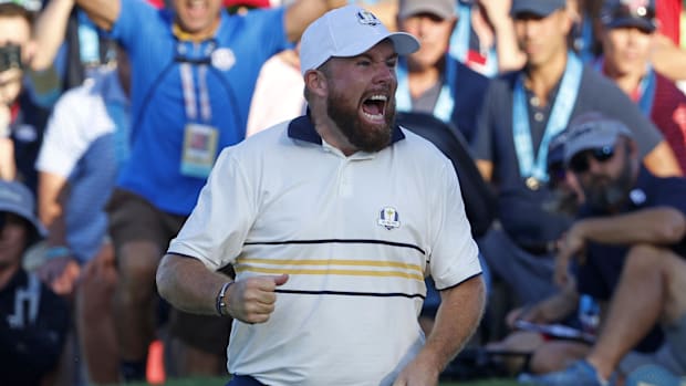 Team Europe golfer Shane Lowry reacts to his putt on the 18th hole on the final day of competition at the 2025 Ryder Cup. 