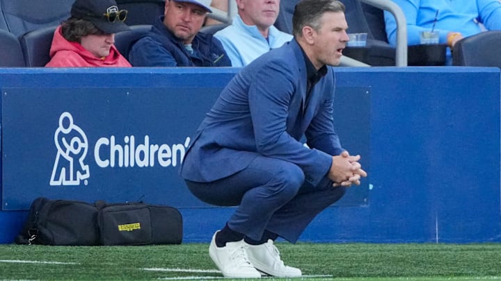 May 4, 2025; Kansas City, Kansas, USA; LA Galaxy head coach Greg Vanney watches play against Sporting Kansas Cityduring the first half at Children's Mercy Park. Mandatory Credit: Denny Medley-Imagn Images