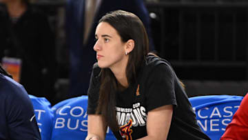 Sep 7, 2025; Baltimore, MD, USA; Indiana Fever guard Caitlin Clark (22) looks on from the bench against the Washington Mystics during the first quarter at CFG Bank Arena. Mandatory Credit: Rafael Suanes-Imagn Images