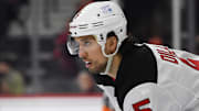 Jan 27, 2025; Philadelphia, Pennsylvania, USA; New Jersey Devils defenseman Brenden Dillon (5) against the Philadelphia Flyers at Wells Fargo Center. Mandatory Credit: Eric Hartline-Imagn Images