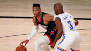 Sep 2, 2020; Lake Buena Vista, Florida, USA; Houston Rockets guard Russell Westbrook (0) dribbles the ball against Oklahoma City Thunder guard Chris Paul (3) during the second half of game seven of the first round of the 2020 NBA Playoffs at ESPN Wide World of Sports Complex. Mandatory Credit: Kim Klement-Imagn Images