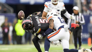 Dec 30, 2023; Nashville, TN, USA; Auburn Tigers safety Caleb Wooden (12) causes the fumble of Maryland Terrapins wide receiver Octavian Smith Jr. (5) during the first half at Nissan Stadium. Mandatory Credit: Steve Roberts-USA TODAY Sports