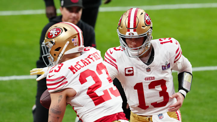 Feb 11, 2024; Paradise, Nevada, USA; San Francisco 49ers quarterback Brock Purdy (13) hands off to San Francisco 49ers running back Christian McCaffrey (23) as they warm up before playing the Kansas City Chiefs in Super Bowl LVIII at Allegiant Stadium. Mandatory Credit: Stephen R. Sylvanie-USA TODAY Sports