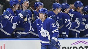 Mar 3, 2025; Toronto, Ontario, CAN; Toronto Maple Leafs forward Matthew Knies (23) gets congratulated after a goal against the San Jose Sharks during the second period at Scotiabank Arena. Mandatory Credit: John E. Sokolowski-Imagn Images