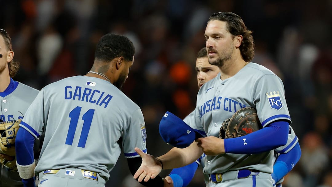May 19, 2025; San Francisco, California, USA;  Kansas City Royals first baseman Vinnie Pasquantino (9) is congratulated by teammates after the game against the San Francisco Giants at Oracle Park. Mandatory Credit: Sergio Estrada-Imagn Images