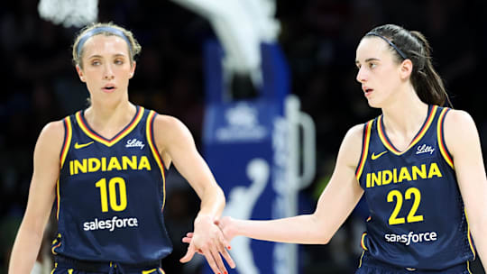 May 3, 2024; Dallas, Texas, USA; Indiana Fever guard Caitlin Clark (22) celebrates with Indiana Fever guard Lexie Hull (10) during the second quarter against the Dallas Wings at College Park Center.  Mandatory Credit: Kevin Jairaj-Imagn Images