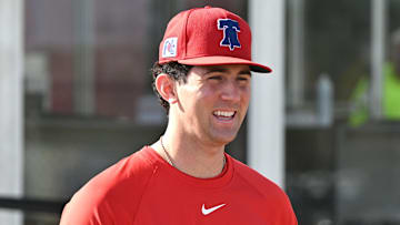 Feb 12, 2025; Clearwater, FL, USA; Philadelphia Phillies pitcher Andrew Painter (76) walks onto the field before the start of a spring training workout at Carpenter Complex