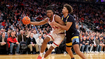 Mar 14, 2025; New York, NY, USA; St. John's Red Storm forward Zuby Ejiofor (24) drives to the basket against Marquette Golden Eagles forward Royce Parham (13) during the second half at Madison Square Garden. Mandatory Credit: Brad Penner-Imagn Images
