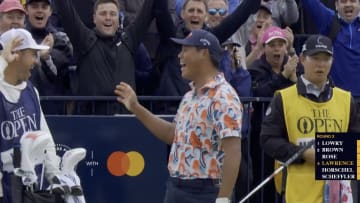 Si Woo Kim celebrates hitting a hole-in-one on Hole 17 at the 2024 Open Championship at Royal Troon.