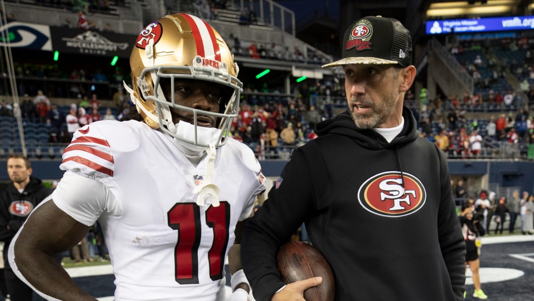 San Francisco 49ers wide receiver Brandon Aiyuk (L) and head coach Kyle Shanahan (R)