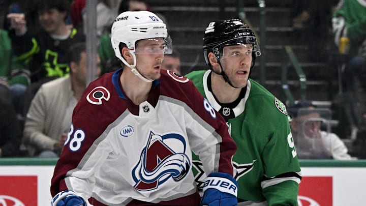 Apr 4, 2026; Dallas, Texas, USA; Colorado Avalanche center Martin Necas (88) and Dallas Stars right wing Mikko Rantanen (96) look for the puck during the game between the Stars and the Avalanche at American Airlines Center. Mandatory Credit: Jerome Miron-Imagn Images