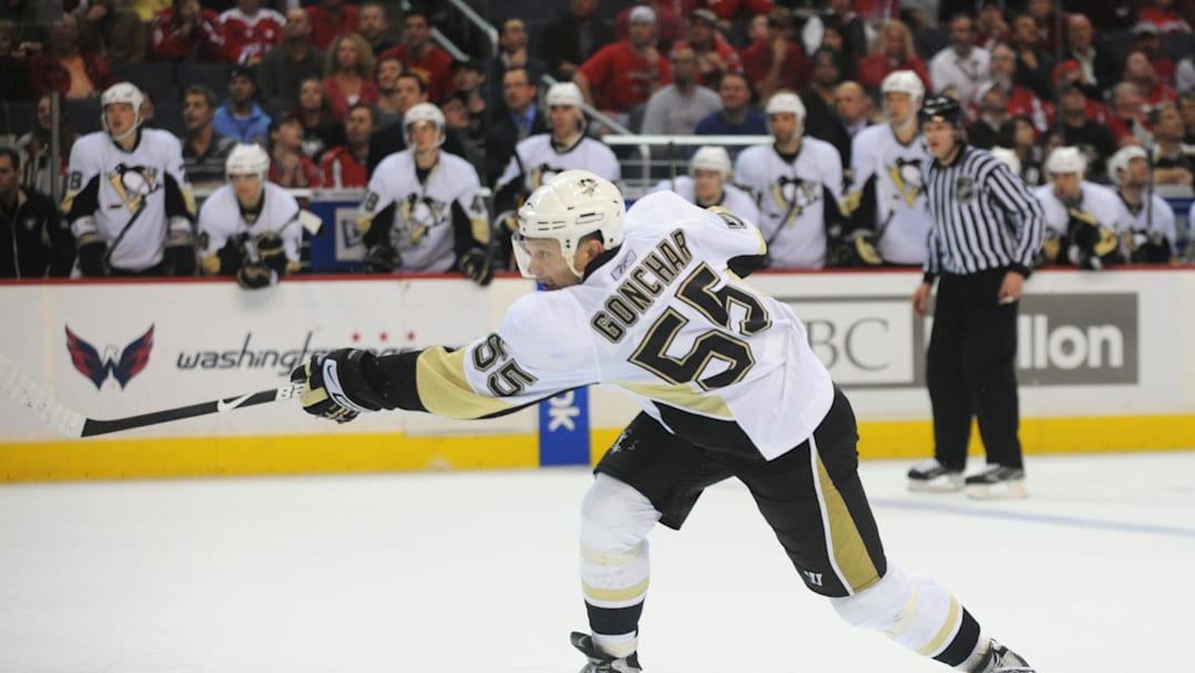 Mar 8, 2009; Washington, DC, USA; Pittsburgh Penguins defenseman Sergei Gonchar (55) shoots and scores a goal in the second period against the Washington Capitals at Verizon Center. Mandatory Credit: James Lang-Imagn Images