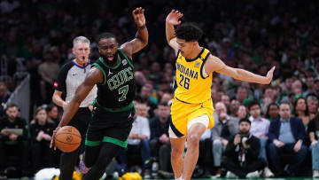 May 23, 2024; Boston, Massachusetts, USA; Boston Celtics guard Jaylen Brown (7) dribbles the ball past Indiana Pacers guard Ben Sheppard (26) in the first half during game two of the eastern conference finals for the 2024 NBA playoffs at TD Garden. Mandatory Credit: David Butler II-USA TODAY Sports