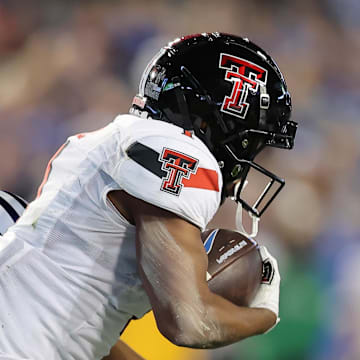 Texas Tech Red Raiders wide receiver returns a punt against the Brigham Young Cougars. Mandatory Credit: Rob Gray-Imagn Images