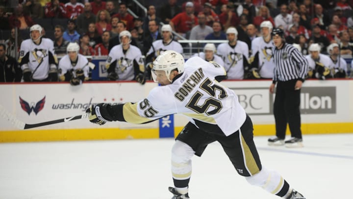 Mar 8, 2009; Washington, DC, USA; Pittsburgh Penguins defenseman Sergei Gonchar (55) shoots and scores a goal in the second period against the Washington Capitals at Verizon Center. Mandatory Credit: James Lang-Imagn Images