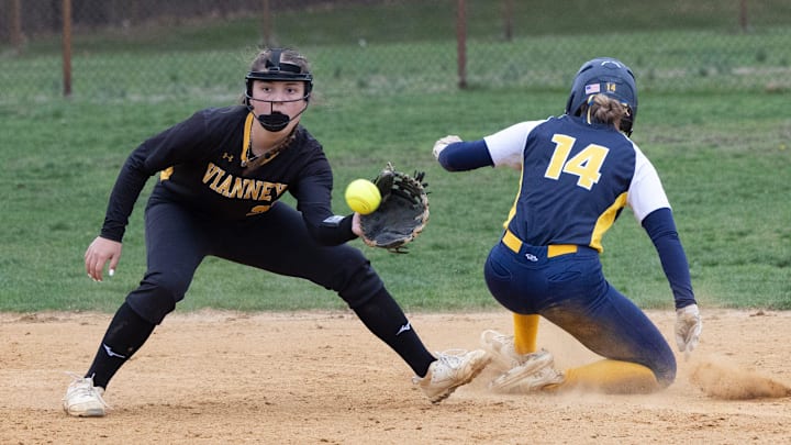 Marlboro’s Aimee Notaro is safe at second as they throw to SJV’s Gabby Gonzalez arrives late. St. John Vianney Softball defeats Marlboro in Holmdel on April 10, 2025