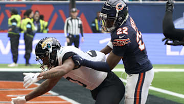 Oct 13, 2024; London, United Kingdom; Chicago Bears safety Elijah Hicks (22) breaks up a pass in the end zone for Jacksonville Jaguars wide receiver Gabe Davis (0)during an NFL International Series game at Tottenham Hotspur Stadium. 