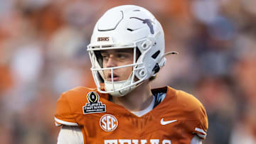 Dec 21, 2024; Austin, Texas, USA; Texas Longhorns quarterback Arch Manning (16) against the Clemson Tigers during the CFP National playoff first round at Darrell K Royal-Texas Memorial Stadium. Mandatory Credit: Mark J. Rebilas-Imagn Images