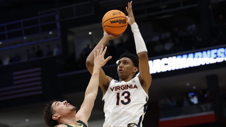 Ryan Dunn shoots a jumper during the Virginia men's basketball game vs. Colorado State in the 2024 NCAA Tournament in Dayton.