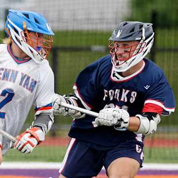 Penn Yan’s Teagan Fingar (2) drives to the goal in a game against Chenango Forks during the 2025 season.