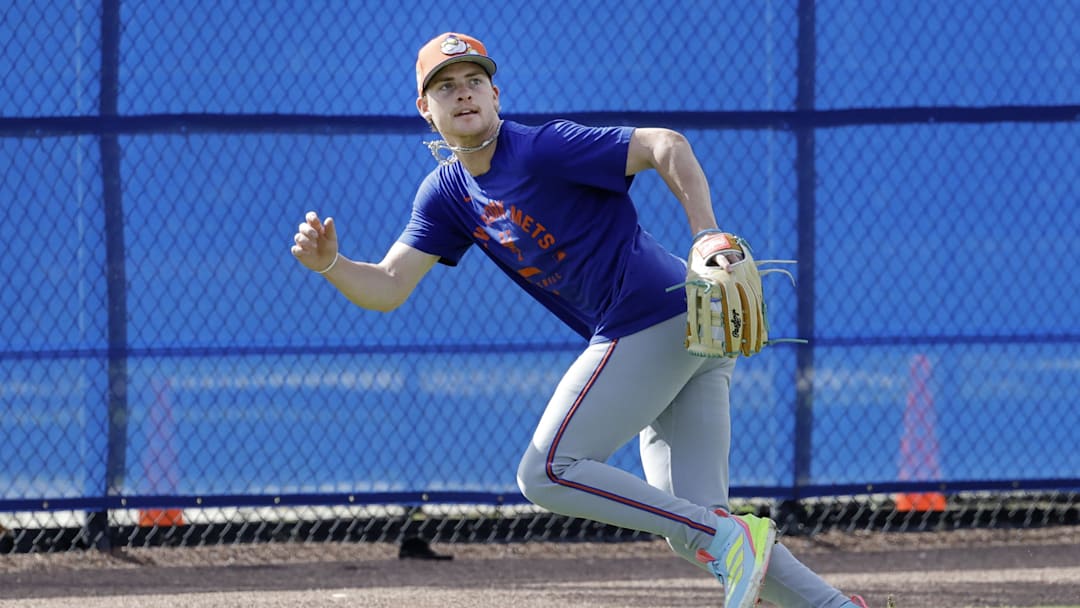 Feb 18, 2026; Port St. Lucie, FL, USA;  New York Mets outfielder Carson Benge (93) chases a fly ball during spring training workouts at Clover Park. Mandatory Credit: Reinhold Matay-Imagn Images