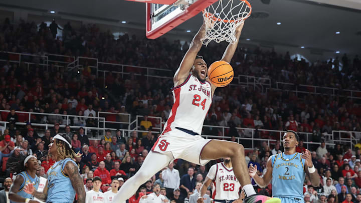 Nov 3, 2025; Queens, New York, USA;  St. John's Red Storm forward Zuby Ejiofor (24) dunks in the second half against the Quinnipiac Bobcats at Carnesecca Arena. 