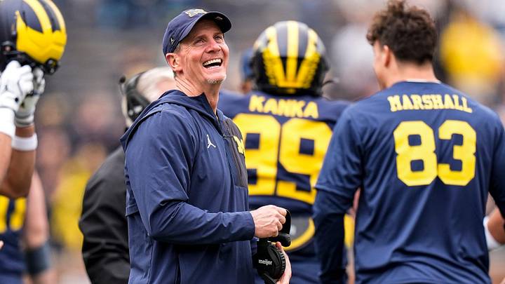 Michigan defensive coordinator Jay Hill celebrates a play during the spring game at Michigan Stadium in Ann Arbor on Saturday, April 18, 2026.