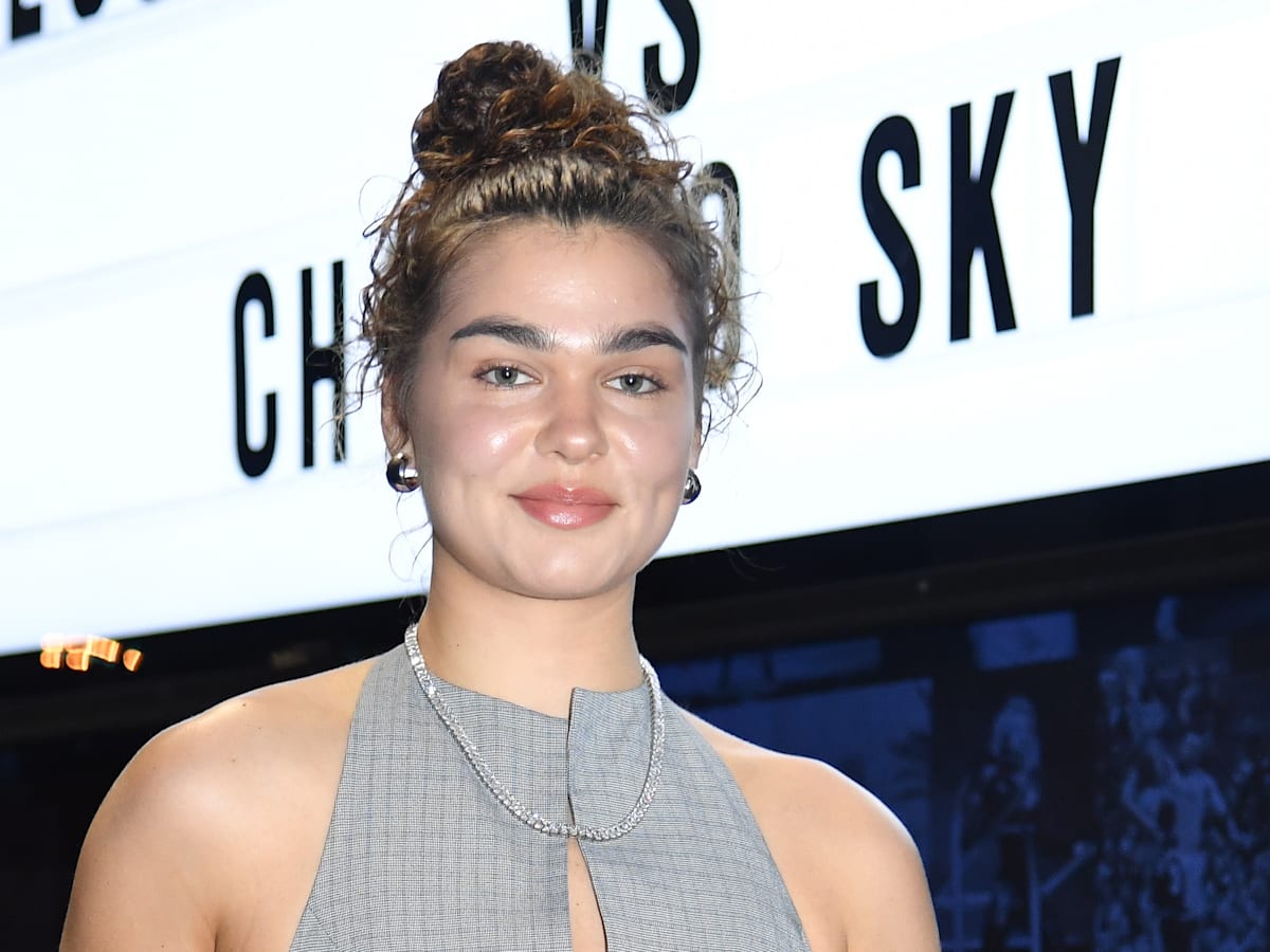 WNBA Star Maddy Westbeld's Crisp White Tank Look Gets a Vibrant Upgrade