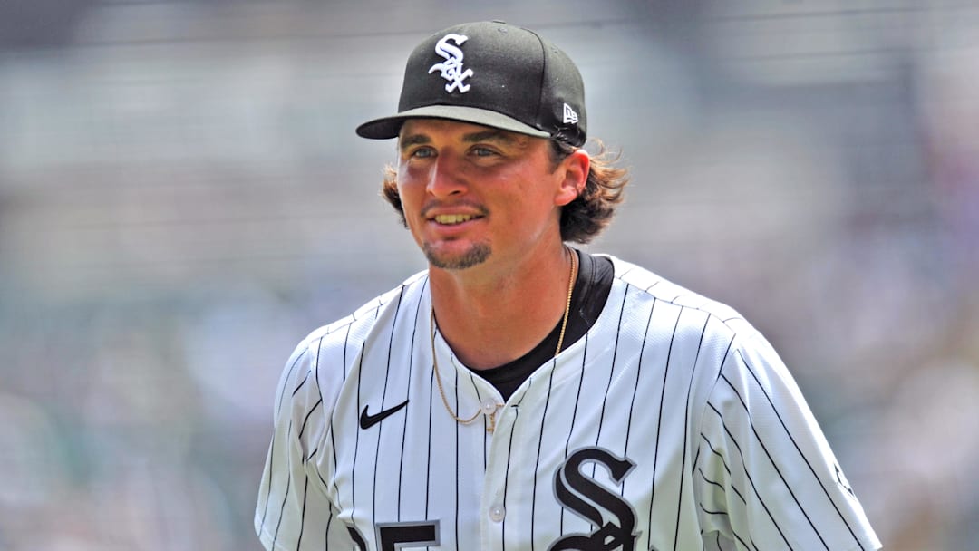 Aug 10, 2025; Chicago, Illinois, USA; Chicago White Sox starting pitcher Davis Martin (65) smiles after ending the first inning against the Cleveland Guardians at Rate Field. Mandatory Credit: Patrick Gorski-Imagn Images