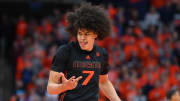 Jan 20, 2024; Syracuse, New York, USA; Miami (Fl) Hurricanes guard Kyshawn George (7) reacts to his three-point basket against the Syracuse Orange during the second half at the JMA Wireless Dome. Mandatory Credit: Rich Barnes-USA TODAY Sports