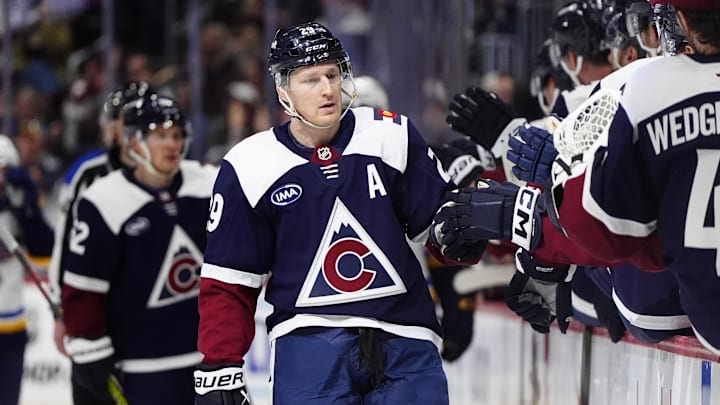 Mar 29, 2025; Denver, Colorado, USA; Colorado Avalanche center Nathan MacKinnon (29) following his goal scored in the first period against the St. Louis Blues at Ball Arena. Mandatory Credit: Ron Chenoy-Imagn Image