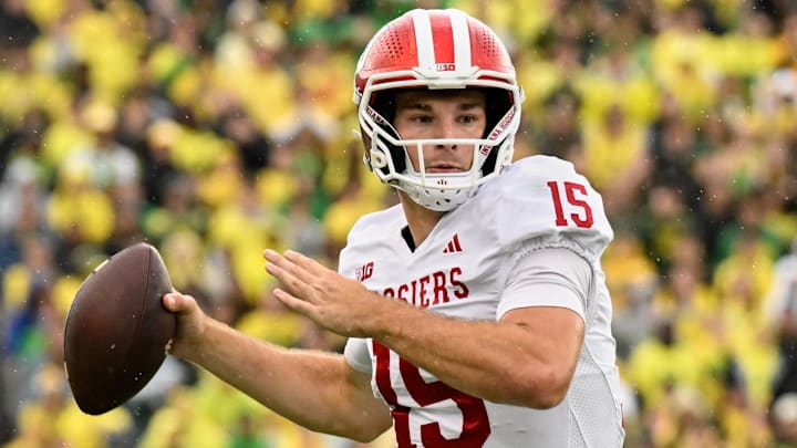 Oct 11, 2025; Eugene, Oregon, USA; Indiana Hoosiers quarterback Fernando Mendoza (15) prepares to throw the ball against the Oregon Ducks during the fourth quarter at Autzen Stadium. Mandatory Credit: Troy Wayrynen-Imagn Images
