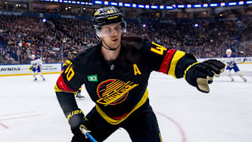 Jan 21, 2025; Vancouver, British Columbia, CAN; Vancouver Canucks forward Elias Pettersson (40) skates against the Buffalo Sabres in the third period at Rogers Arena. Mandatory Credit: Bob Frid-Imagn Images