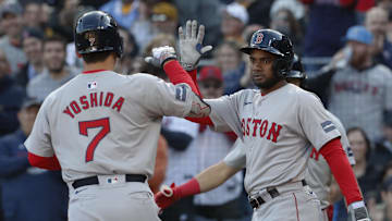 Apr 20, 2024; Pittsburgh, Pennsylvania, USA; Boston Red Sox third baseman Pablo Reyes (19) greets designated hitter  Masataka Yoshida (7) crossing home plate on a two run home run against he Pittsburgh Pirates during the sixth inning at PNC Park. Mandatory Credit: Charles LeClaire-Imagn Images