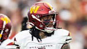 Sep 29, 2024; Glendale, Arizona, USA; Washington Commanders linebacker Frankie Luvu (4) against the Arizona Cardinals at State Farm Stadium. Mandatory Credit: Mark J. Rebilas-Imagn Images