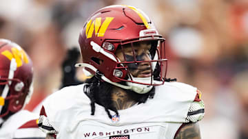 Sep 29, 2024; Glendale, Arizona, USA; Washington Commanders linebacker Frankie Luvu (4) against the Arizona Cardinals at State Farm Stadium. Mandatory Credit: Mark J. Rebilas-Imagn Images
