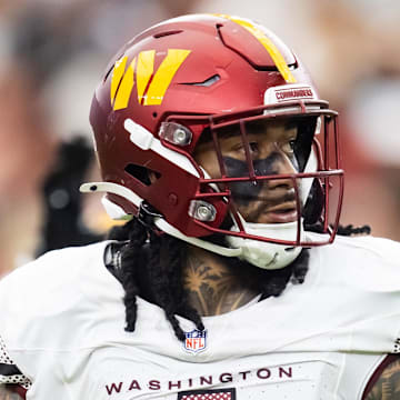 Sep 29, 2024; Glendale, Arizona, USA; Washington Commanders linebacker Frankie Luvu (4) against the Arizona Cardinals at State Farm Stadium. Mandatory Credit: Mark J. Rebilas-Imagn Images
