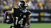 Pittsburgh Steelers wide receiver George Pickens runs after a catch against the Dallas Cowboys during the fourth quarter at Acrisure Stadium. Dallas won 20-17. 