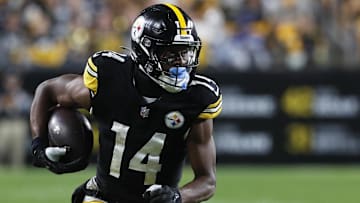 Pittsburgh Steelers wide receiver George Pickens runs after a catch against the Dallas Cowboys during the fourth quarter at Acrisure Stadium. Dallas won 20-17. 