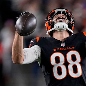 Cincinnati Bengals tight end Mike Gesicki celebrates scoring a first down.