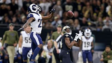 Nov 4, 2018; New Orleans, LA, USA; New Orleans Saints wide receiver Michael Thomas (13) hauls in a touchdown catch that went over the head of Los Angeles Rams cornerback Marcus Peters (22) in the fourth quarter at the Mercedes-Benz Superdome. Saints won, 45-35. Mandatory Credit: Chuck Cook-Imagn Images