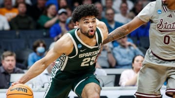 Michigan State forward Malik Hall (25) drives against Mississippi State forward D.J. Jeffries (0) during the first half of NCAA tournament West Region first round at Spectrum Center in Charlotte, N.C. on Thursday, March 21, 2024.