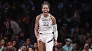 Oct 1, 2024; Brooklyn, New York, USA; Las Vegas Aces center A'ja Wilson (22) celebrates after scoring in the fourth quarter against the New York Liberty during game two of the 2024 WNBA Semi-finals at Barclays Center. 