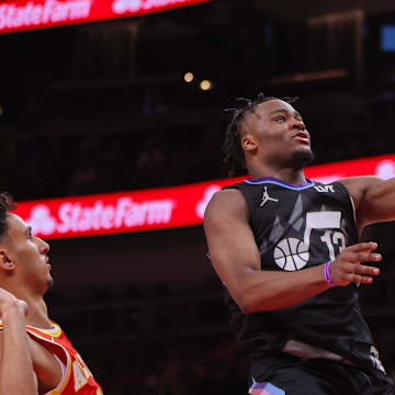 Apr 6, 2025; Atlanta, Georgia, USA; Utah Jazz guard Isaiah Collier (13) shoots against the Atlanta Hawks in the third quarter at State Farm Arena. Mandatory Credit: Brett Davis-Imagn Images