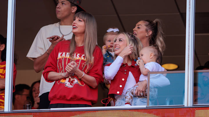 Taylor Swift watches the game between the Kansas City Chiefs and Los Angeles Chargers with Brittany Mahomes on October 22, 2023.